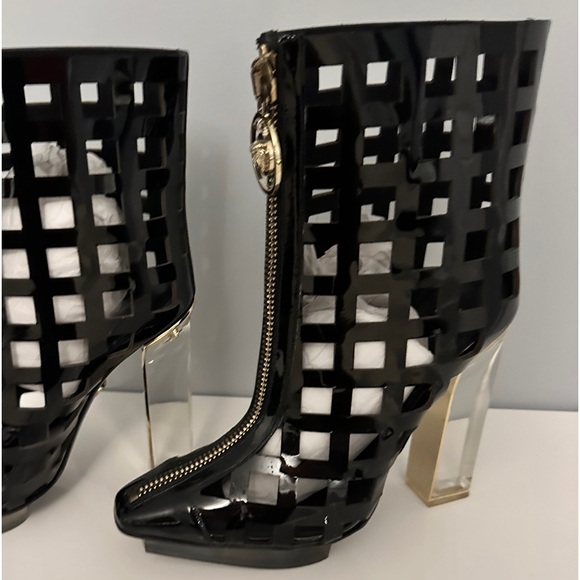 Versace Boots 
Glamorous and stylistic. This statement piece was  worn once. - Picture 6 of 12